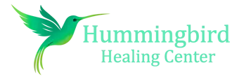 Logo for Hummingbird Healing Center with a green hummingbird graphic.