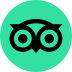 TripAdvisor logo: black owl's eyes, one pupil black, one white, on a teal circle.